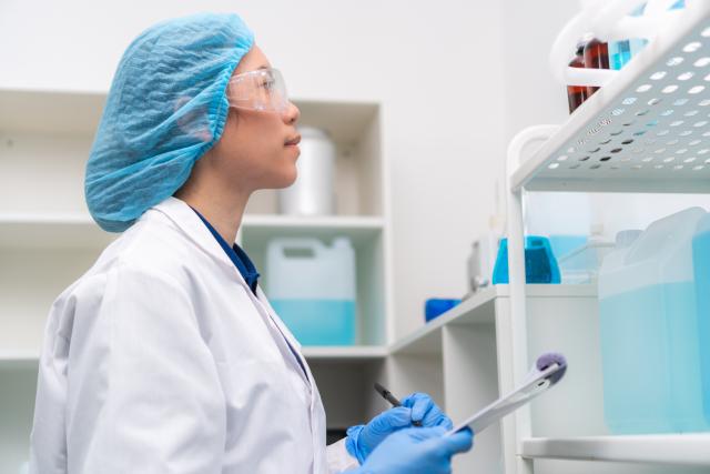 woman reviewing chemicals