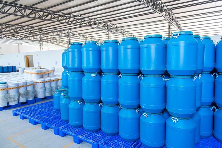 blue waste bins stacked ontop of each other