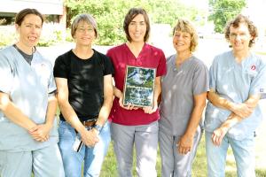 group of people with safety award