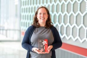 woman standing with staff lab award